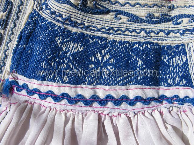 oapan_nahuatl27.JPG - close up of the pleated front of the blouse.